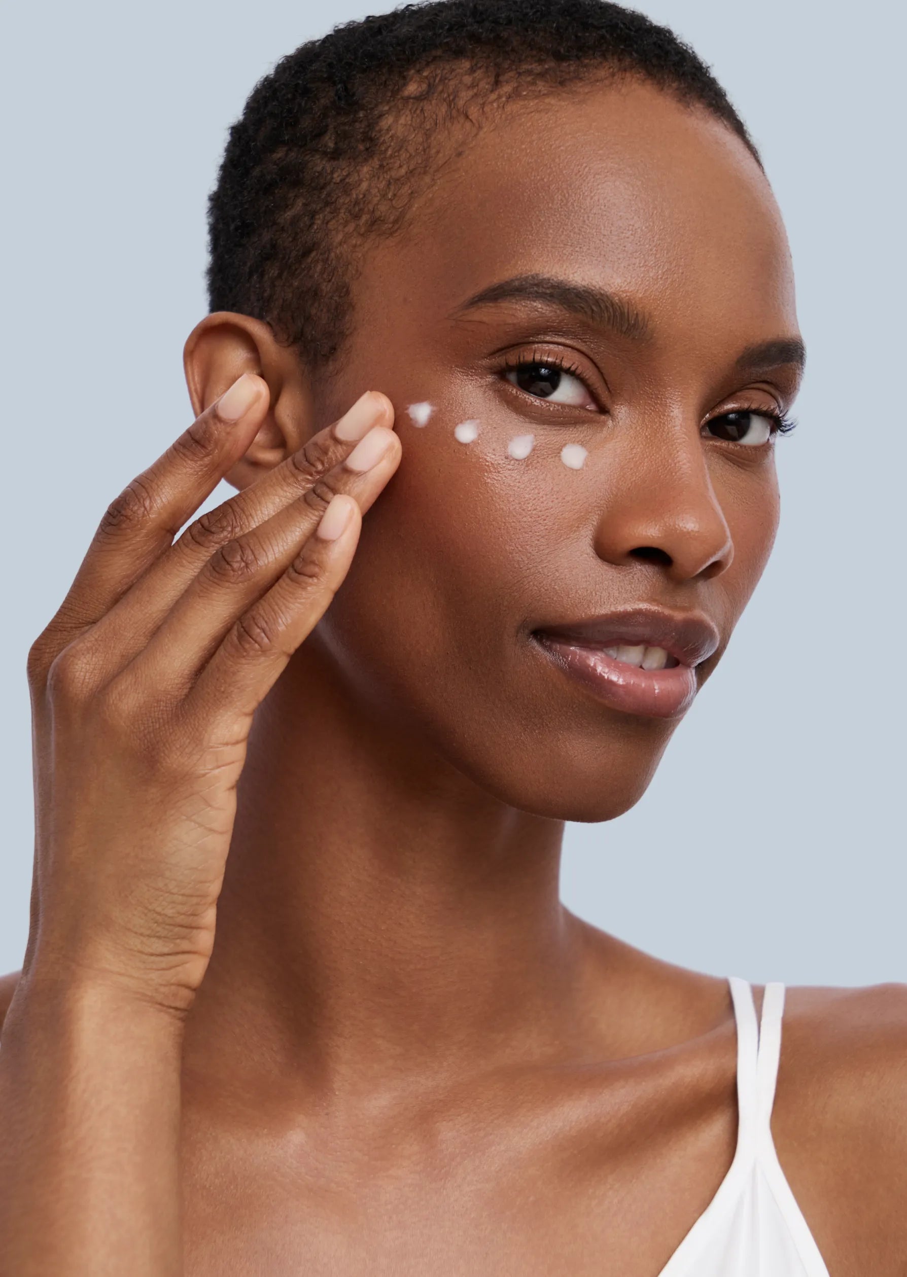 African American Model applying Eye Return