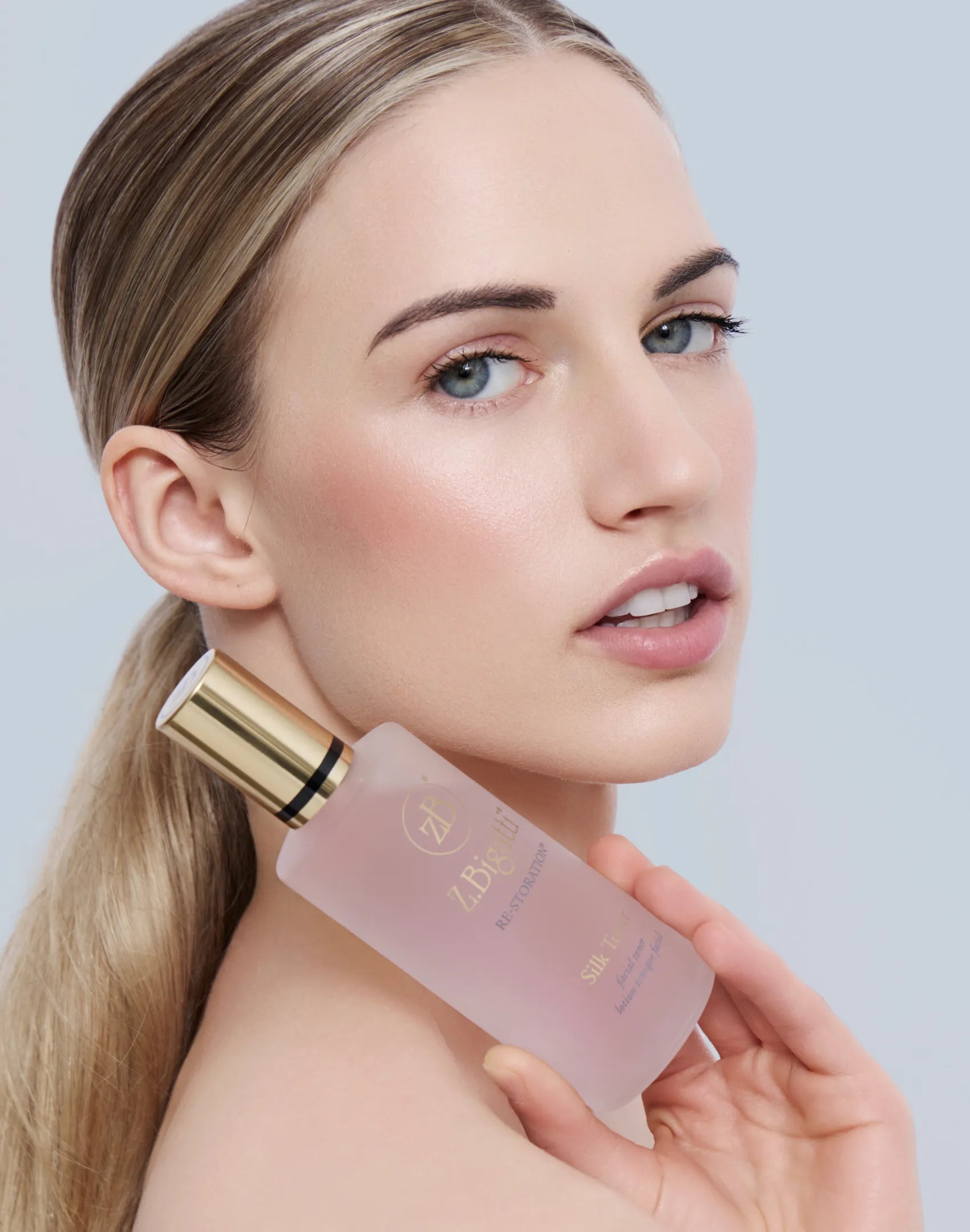 Young Model posing with Z-Bigatti Silk Toner product